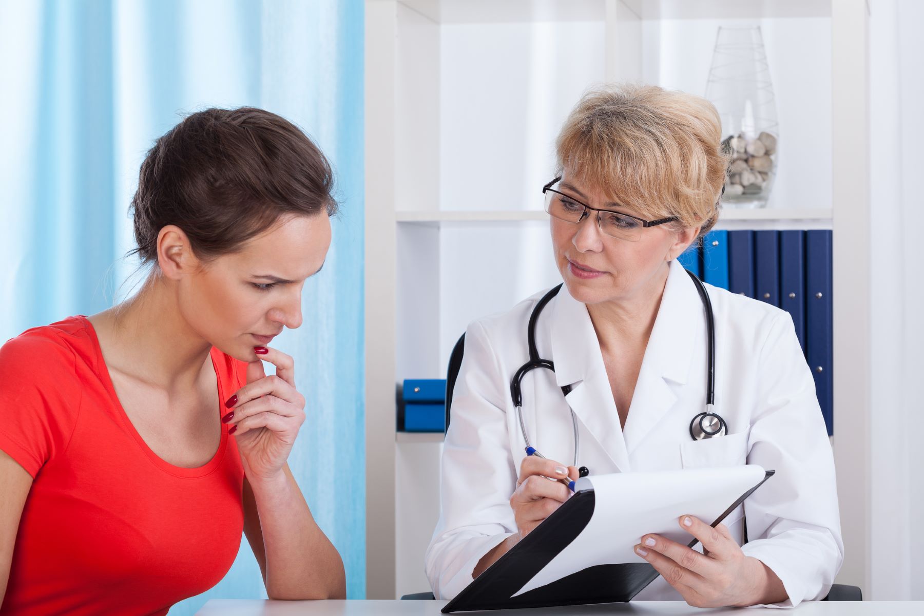 Woman getting hair loss blood test results