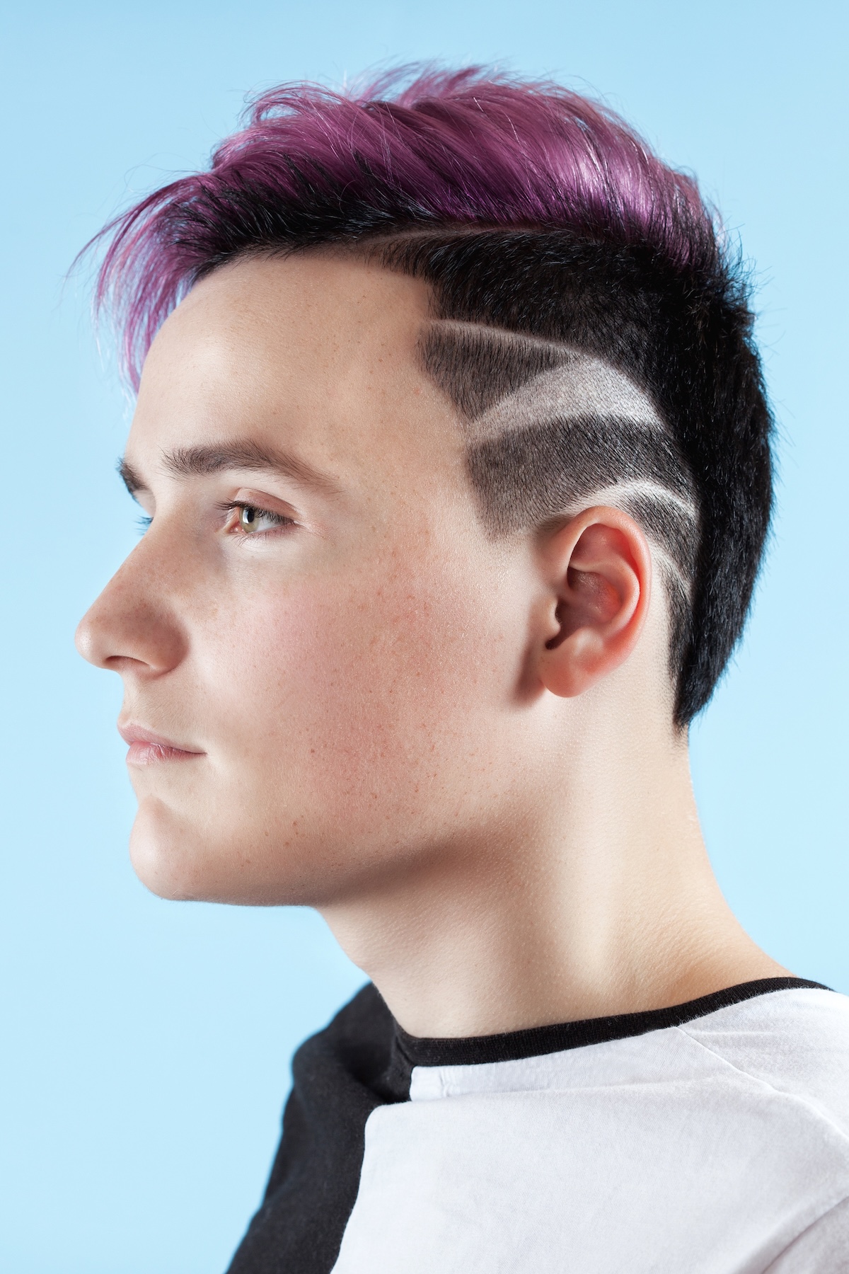 man with creative patterned buzz cut