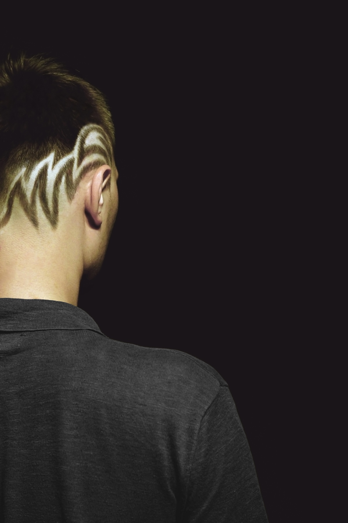 man with patterned buzz cut