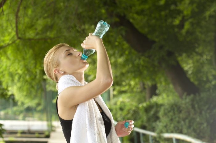 woman staying well-hydrated