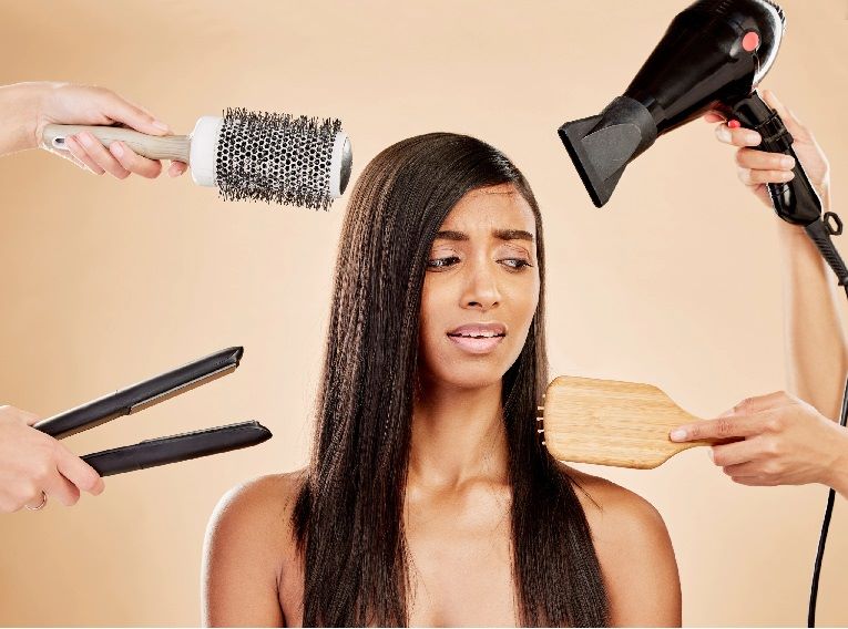 Avoid frequent heat styling to improve hair health