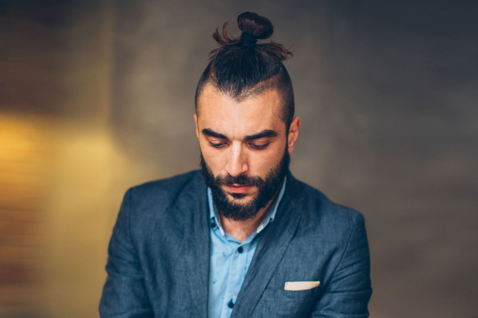 Man wearing a top knot
