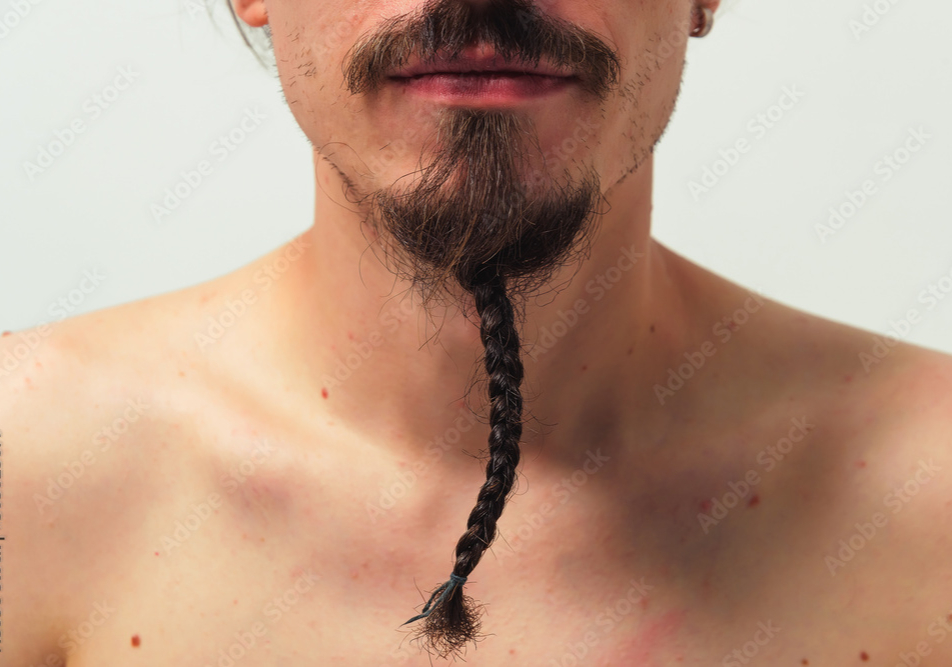 Man with a thin, braided beard