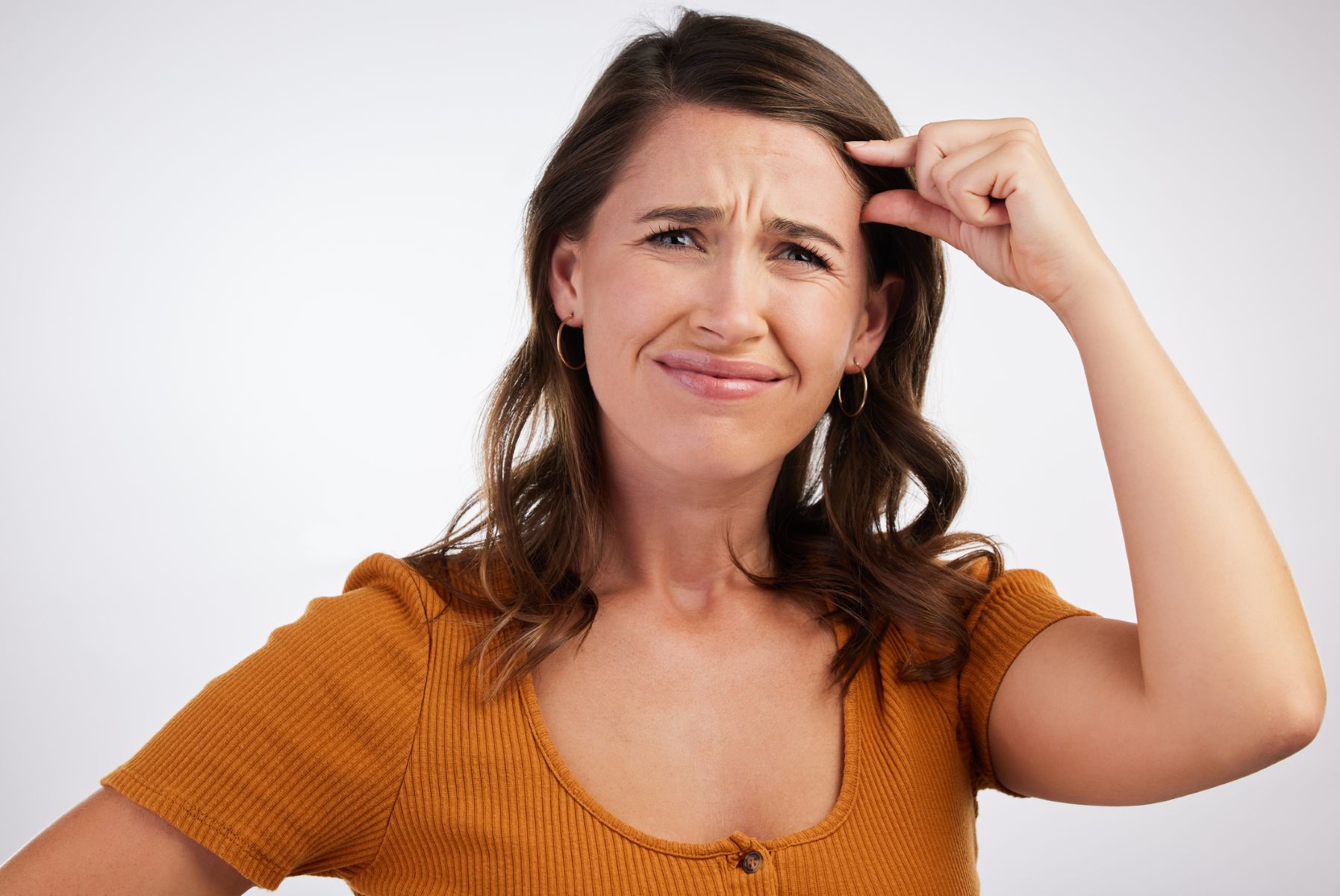 woman wanting to reduce her forehead
