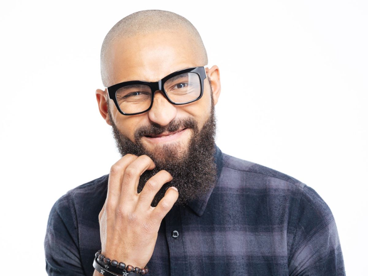 Bald man wearing glasses and a full beard