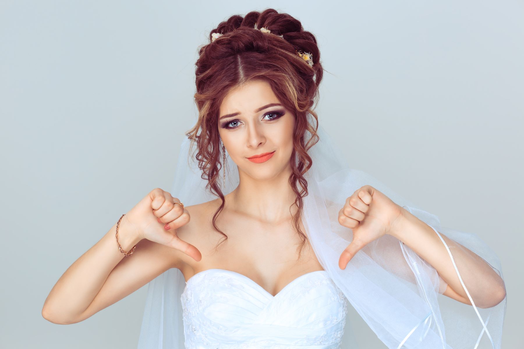 Bride disapproving of wedding hairstyle