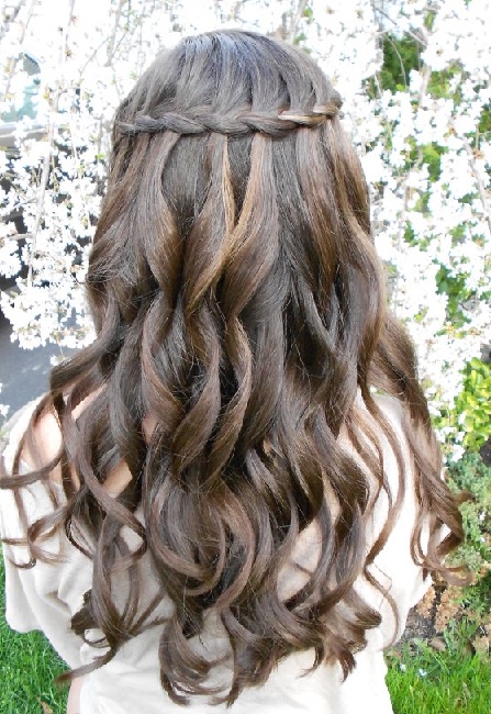 Bride with a waterfall braid with cascading curls
