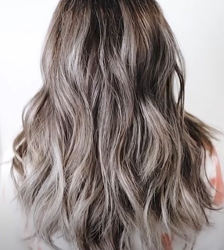 Woman with grey balayage highlights