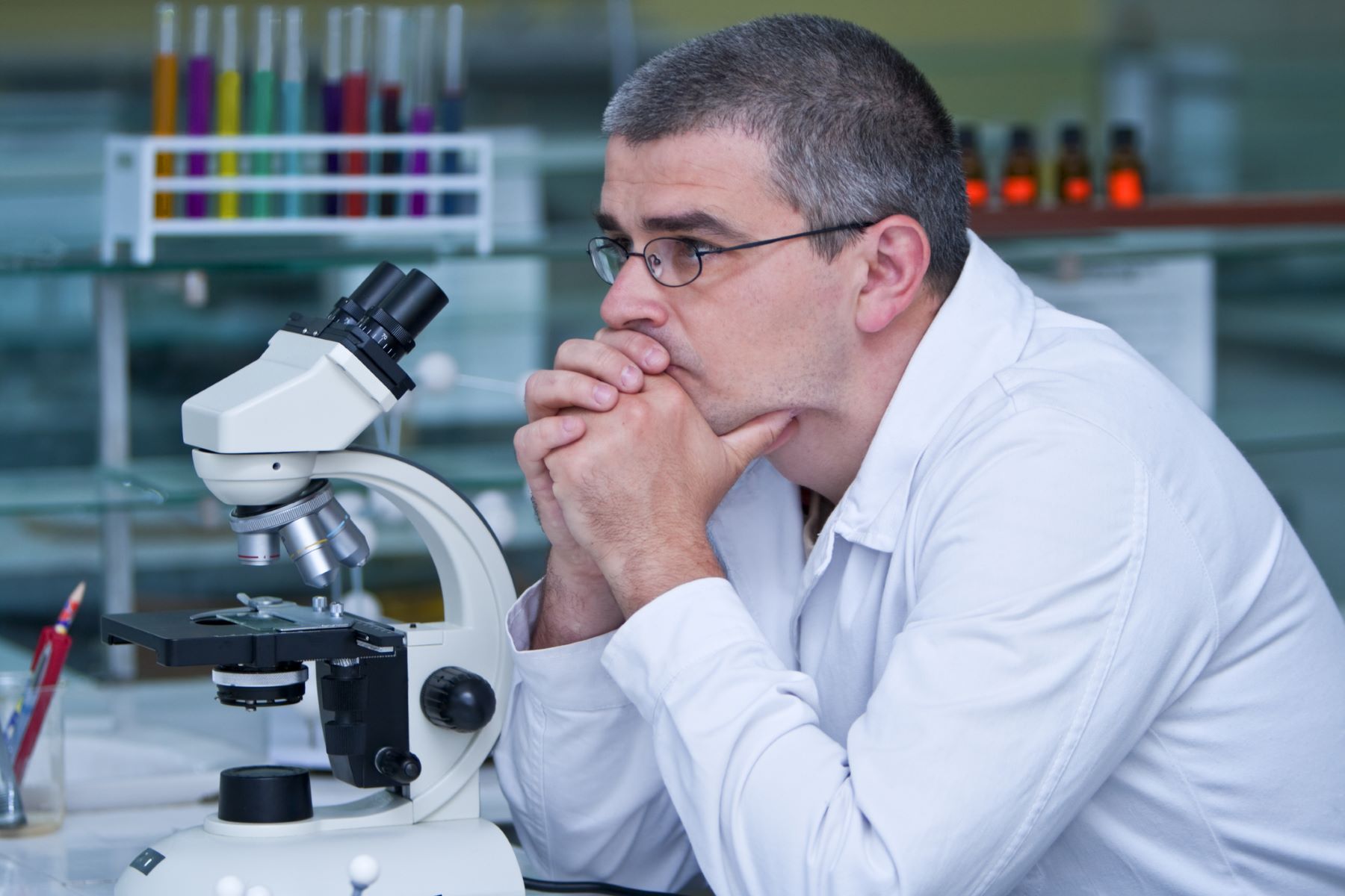 Scientist thinking about resolving hair cloning issues