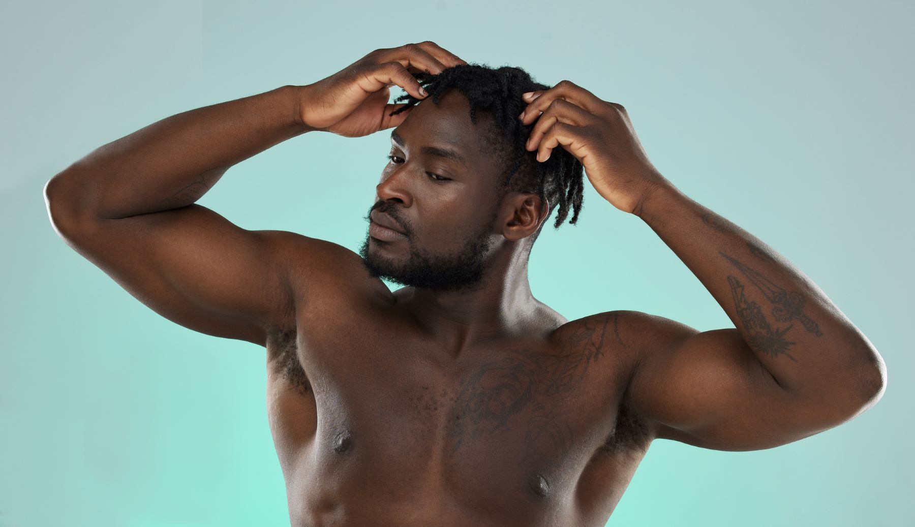 Man giving himself a scalp massage