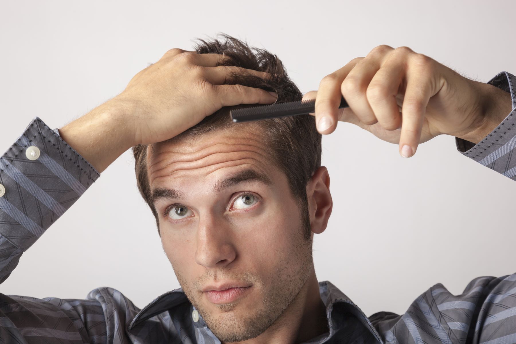 Man wondering how fast his hair is growing