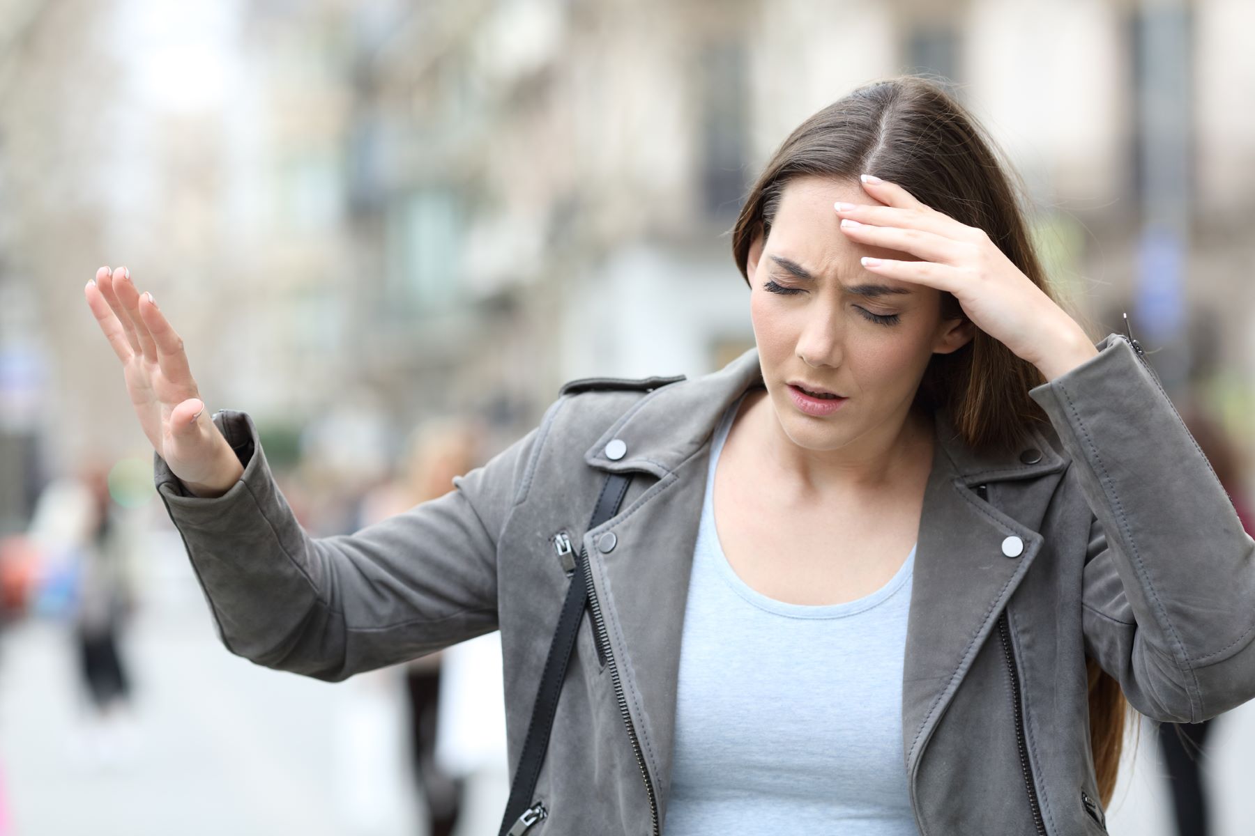 woman feeling ill from iron deficiency anaemia