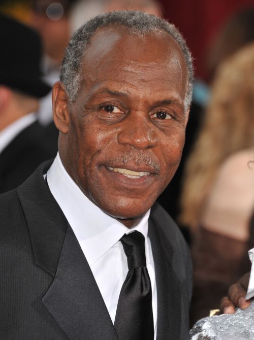 Danny Glover’s short Afro crop works well with his thinning hairline