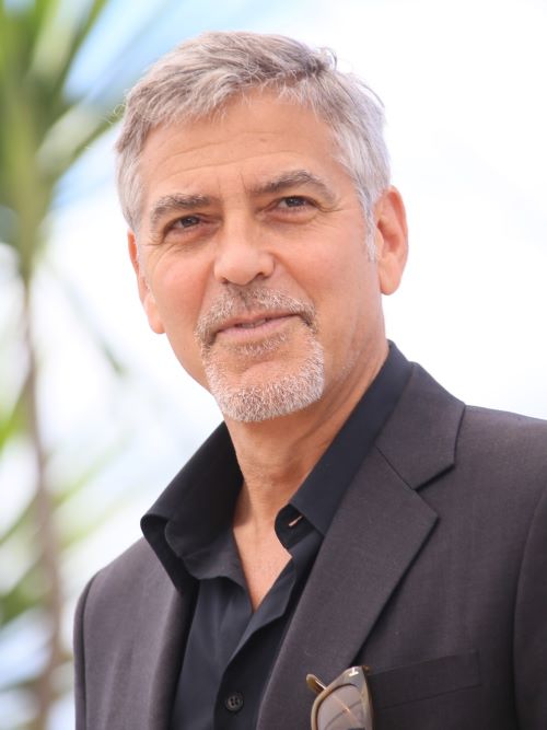 George Clooney’s hairstyle includes a light textured fringe