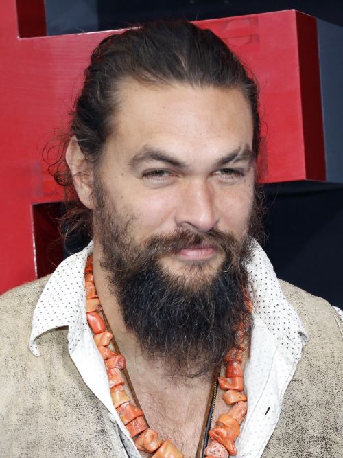 Jason Momoa wearing a top knot