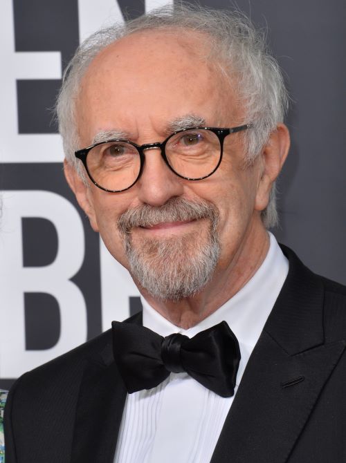 Jonathan Pryce wears stylish specs and a bowtie to complete his look