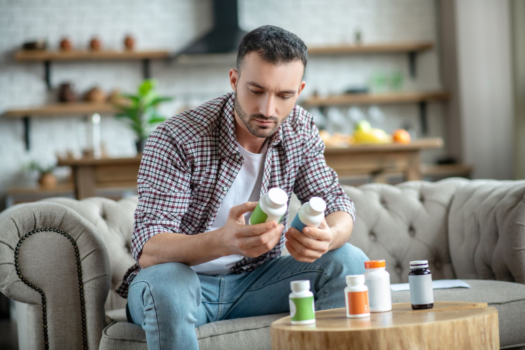 Man comparing hair loss treatments