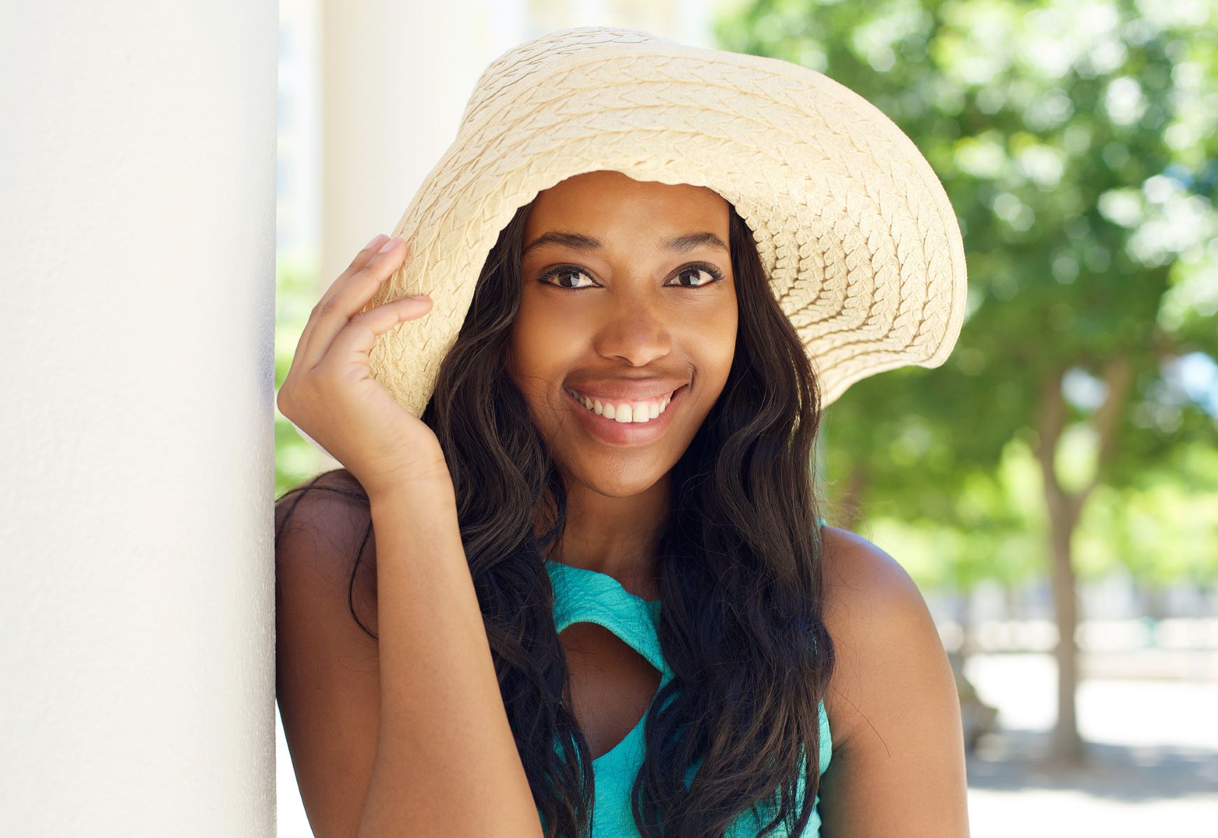 Woman protecting her hair from the sun