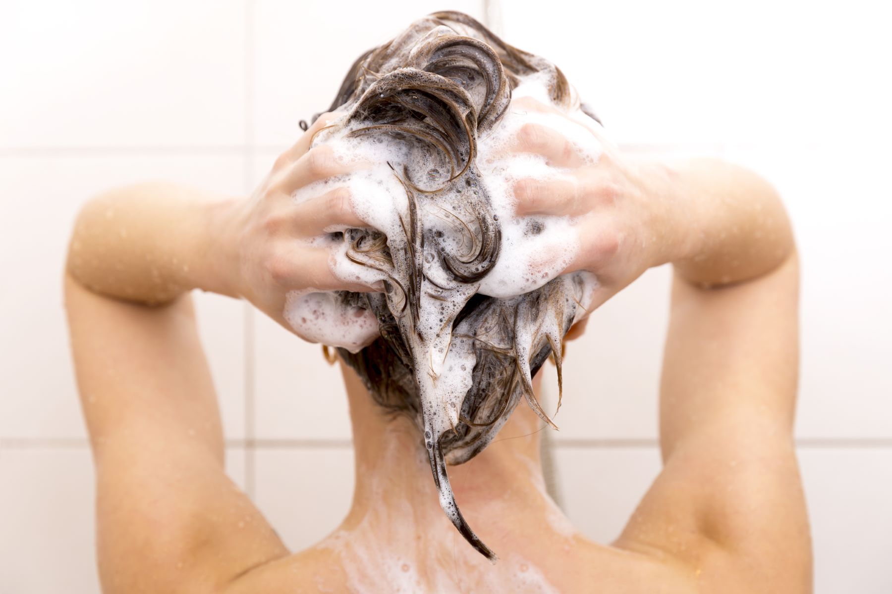 woman washing her hair