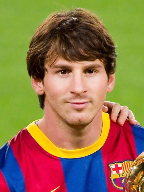 Lionel Messi wearing a mop top haircut