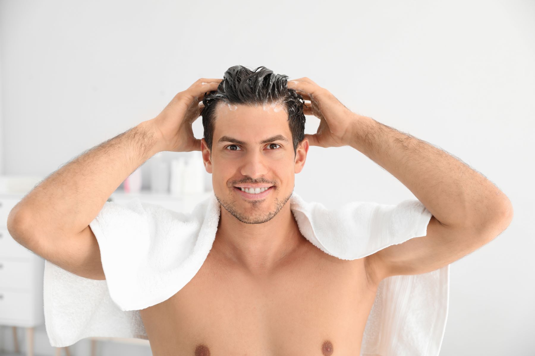 Man looking after his hair after hair transplant