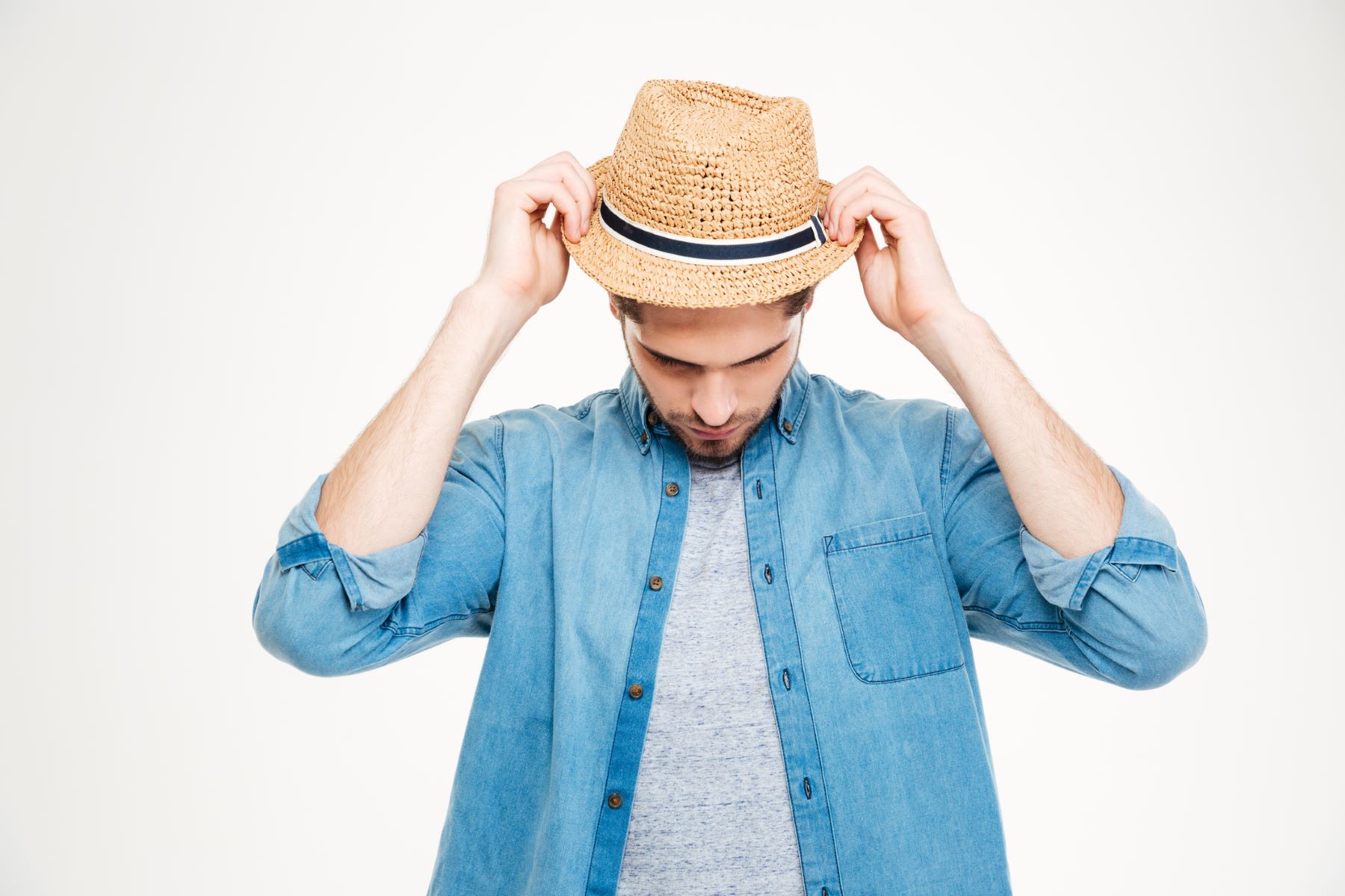 Man wearing the best hat after his hair transplant