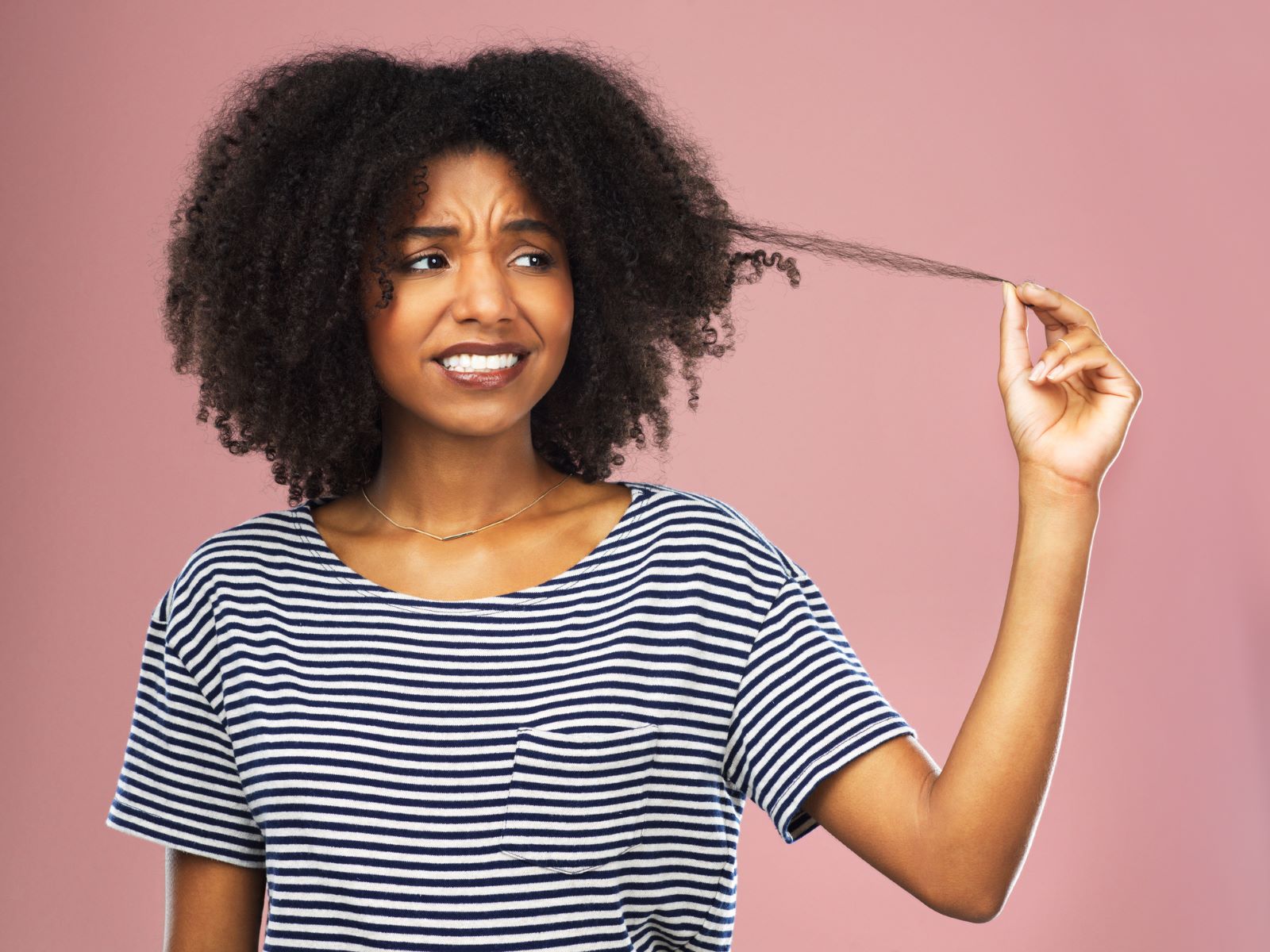 Woman taking hair sample for allergy test