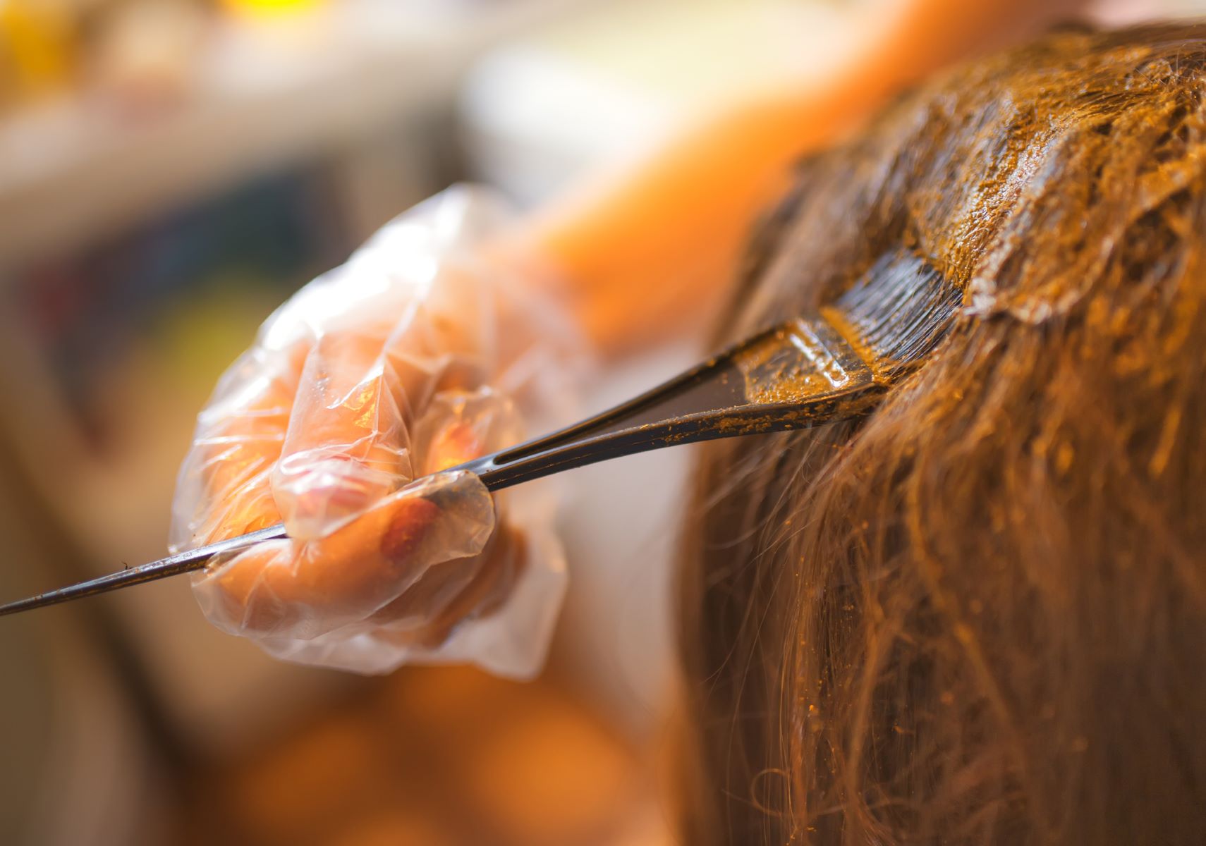 Woman using gentle hair dye