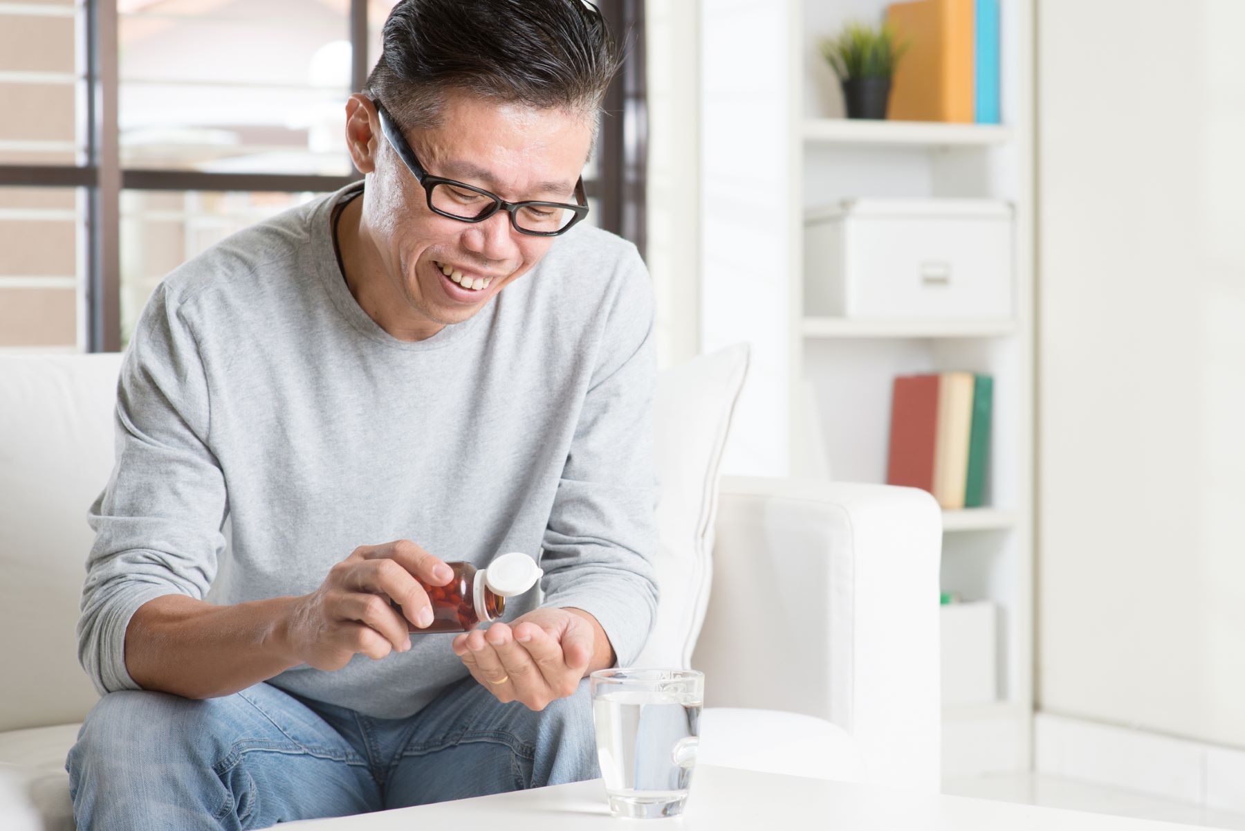 Man taking MSM hair growth supplement