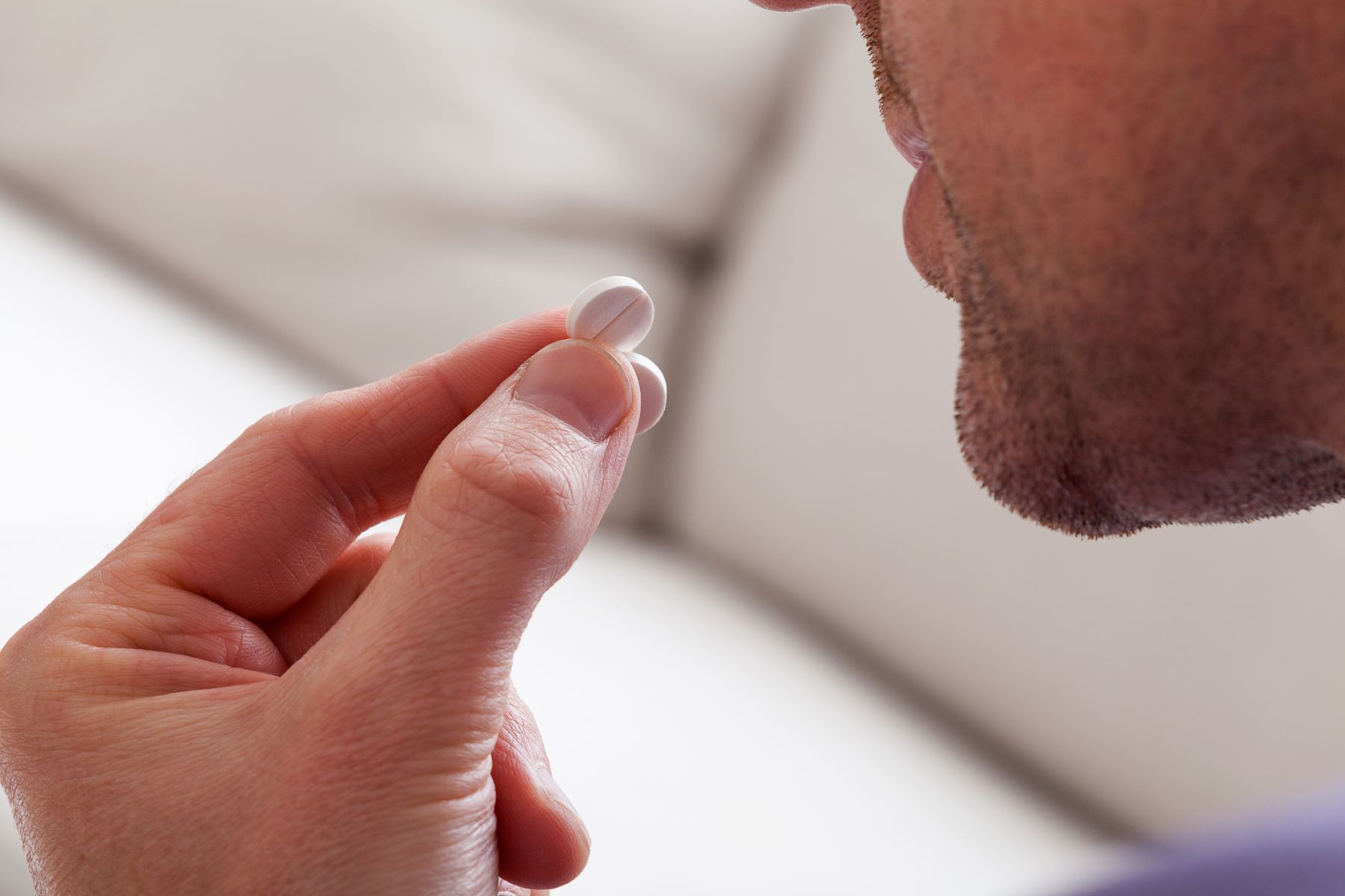 Man taking hair loss medication