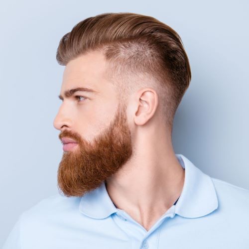 Tapered sideburns with full beard