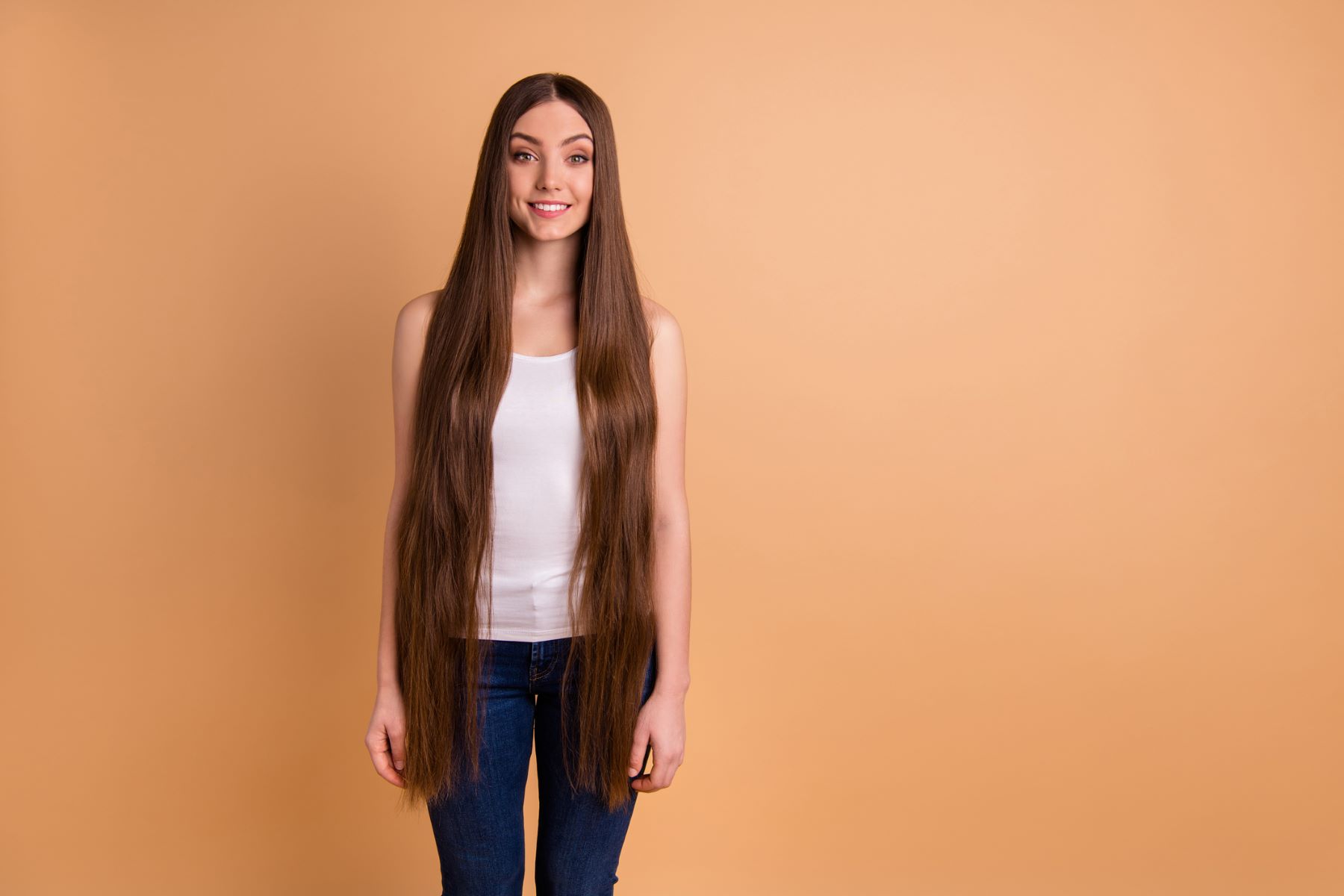 Woman with mid-thigh-length hair