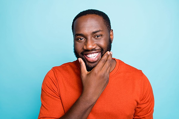 Man with beard growth after using beard growth products