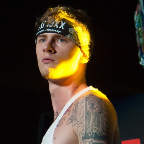 Machine Gun Kelly wearing headband