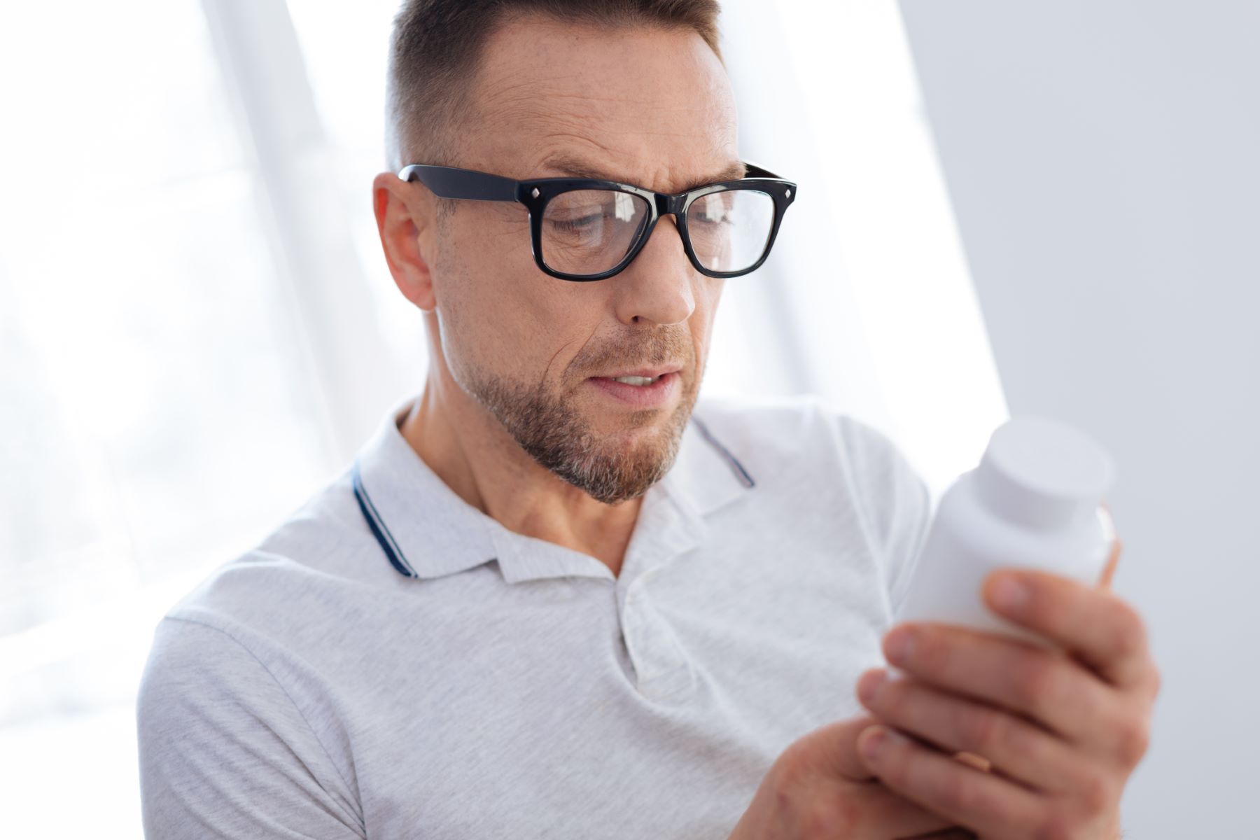 Man wondering whether to discontinue Minoxidil