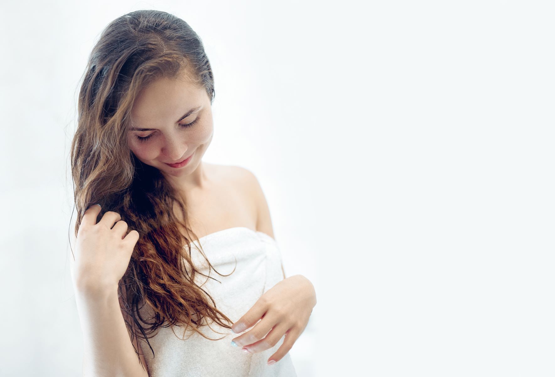 Woman air-drying her hair