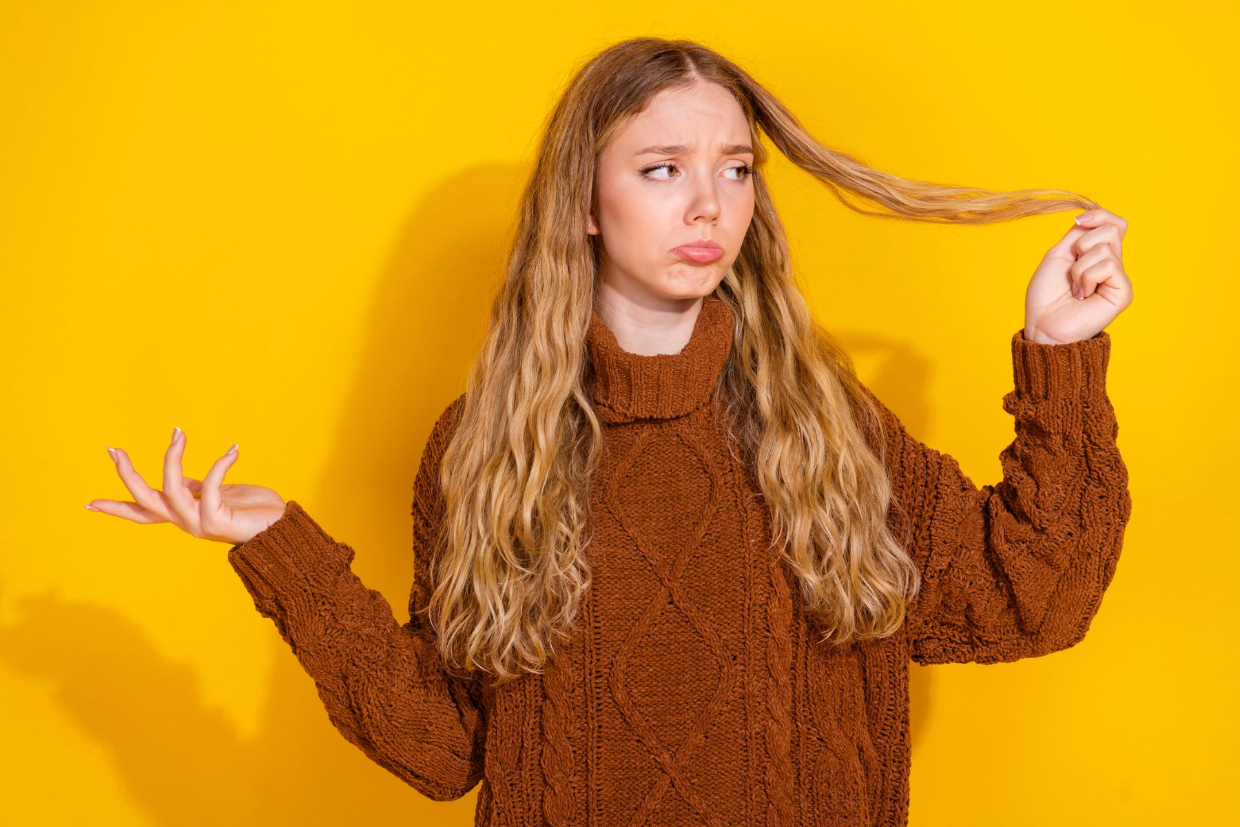 Woman unhappy with results of UV hair protection products