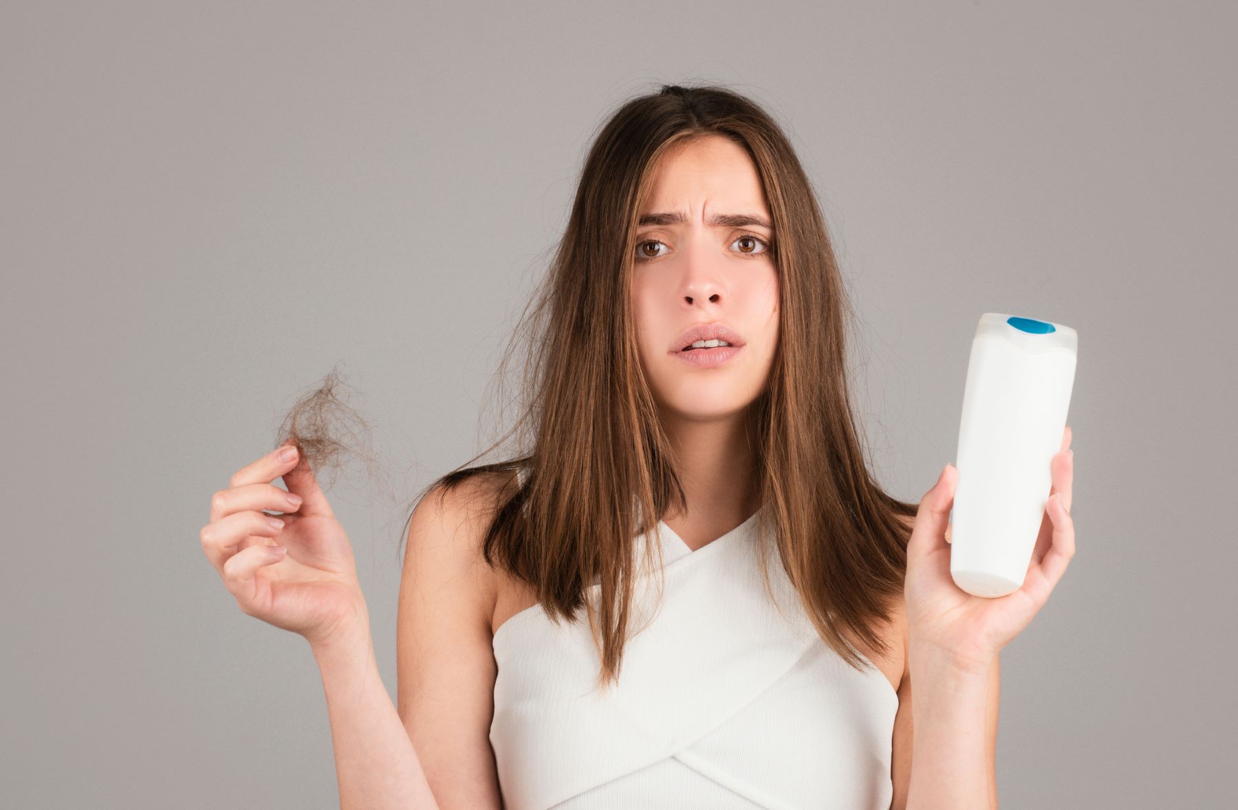 Woman worried about shampoo hair loss