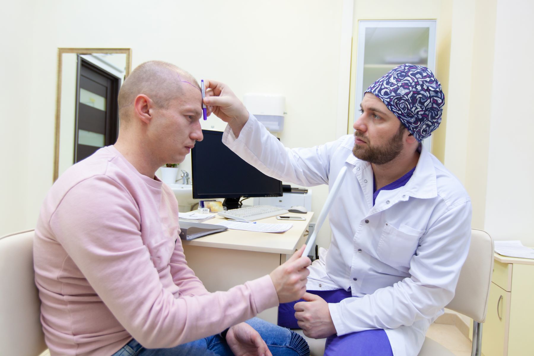 Man getting a hair transplant consultation