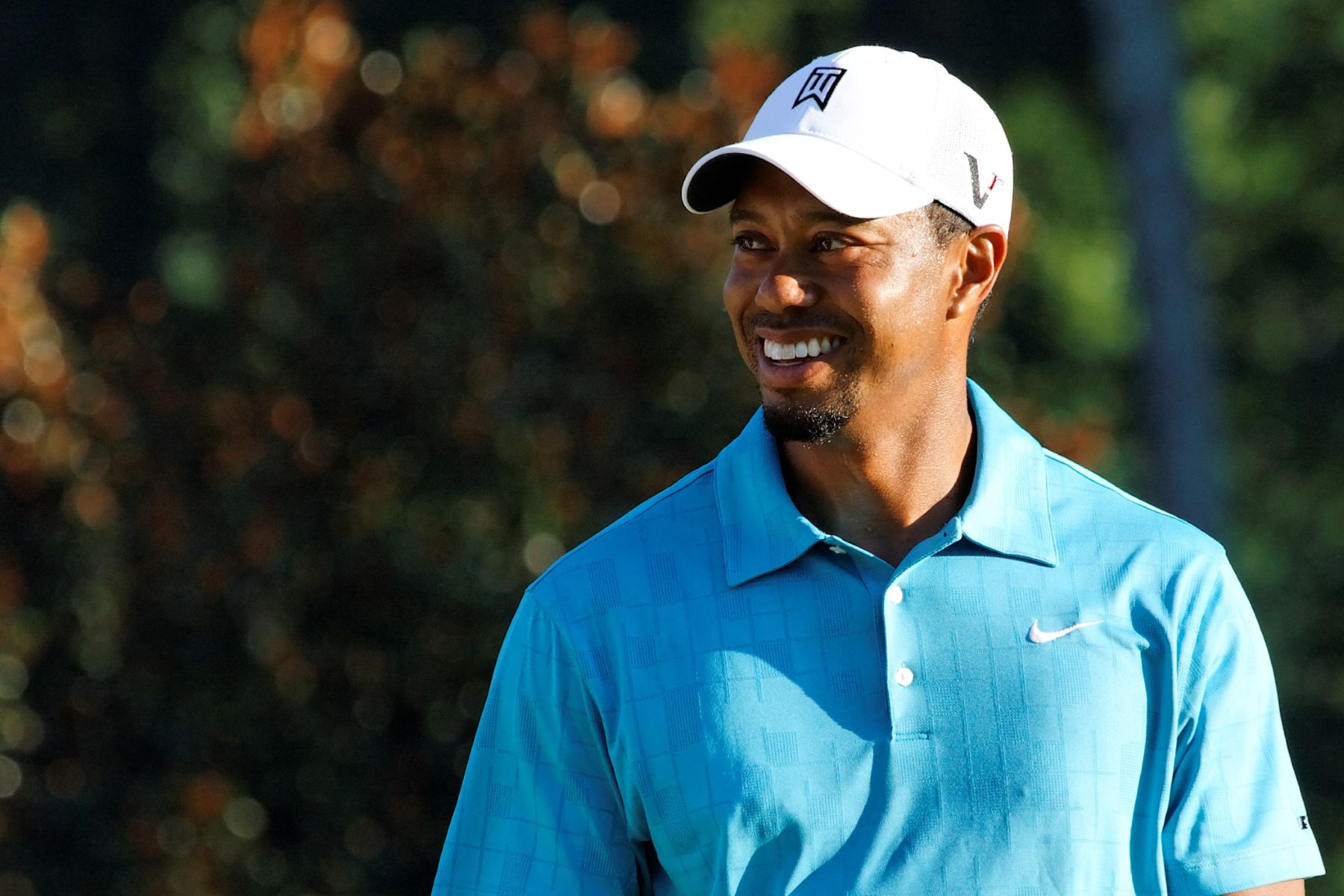 Tiger Woods’ balding covered with cap