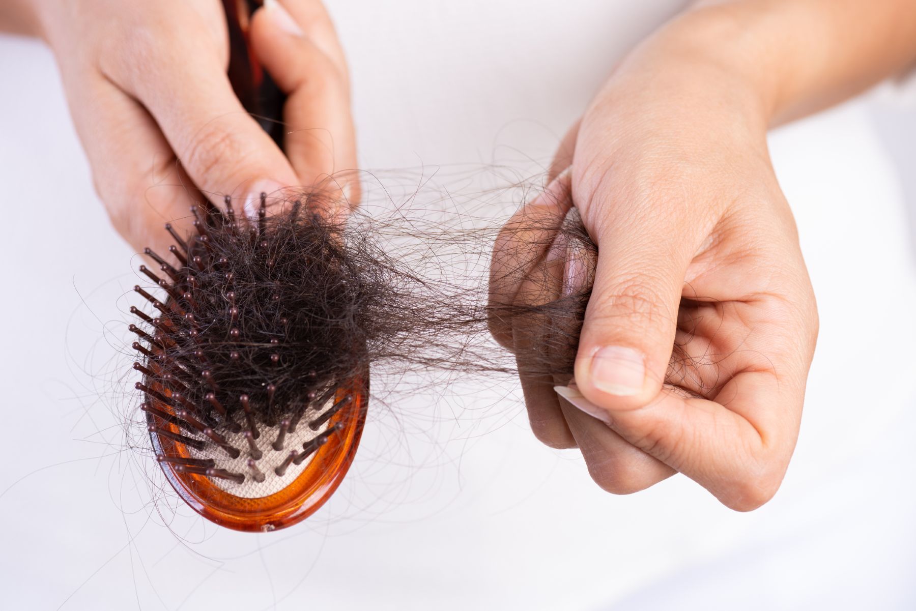 woman experiencing hair loss from Ozempic