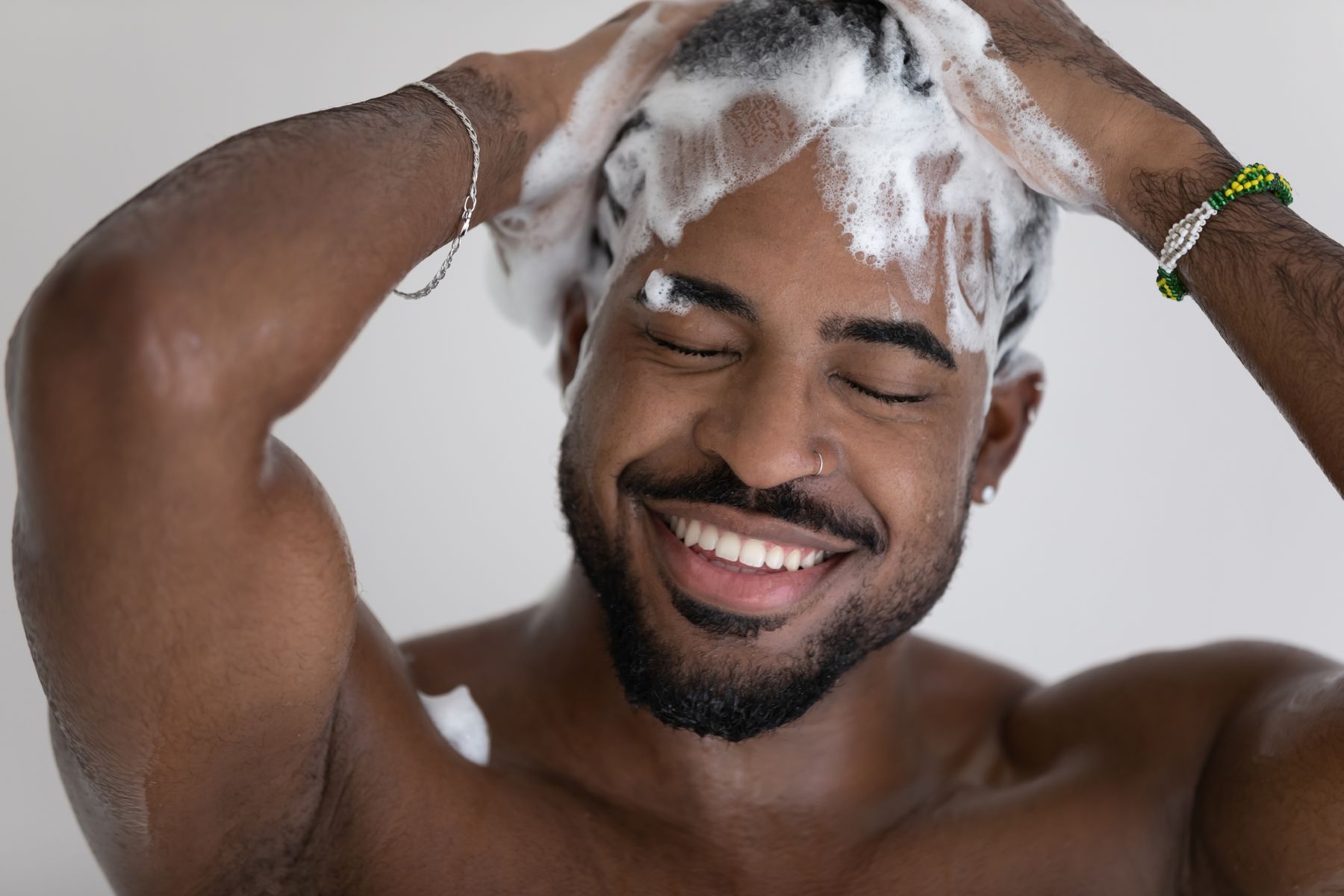 Man washing his hair