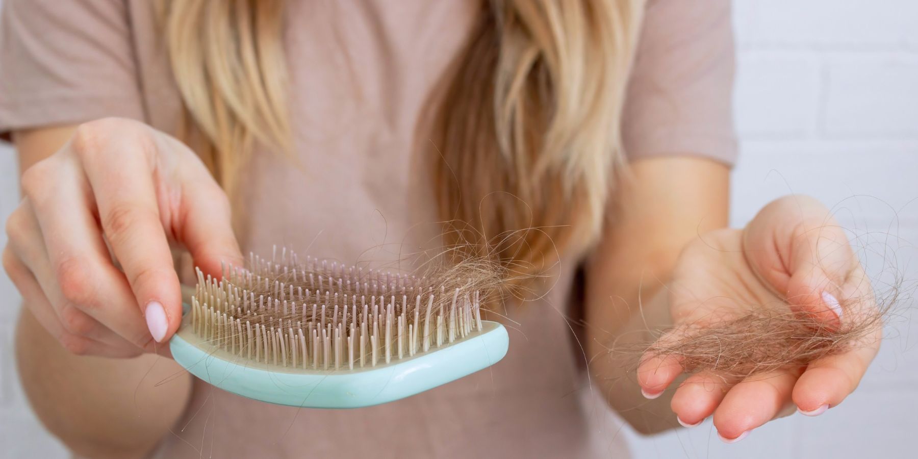 woman experiencing hormonal hair loss