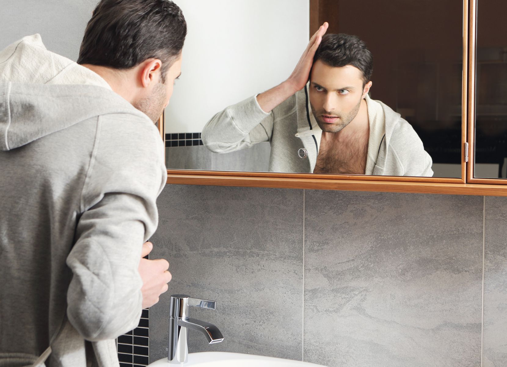 Man considering a hair transplant for vanity