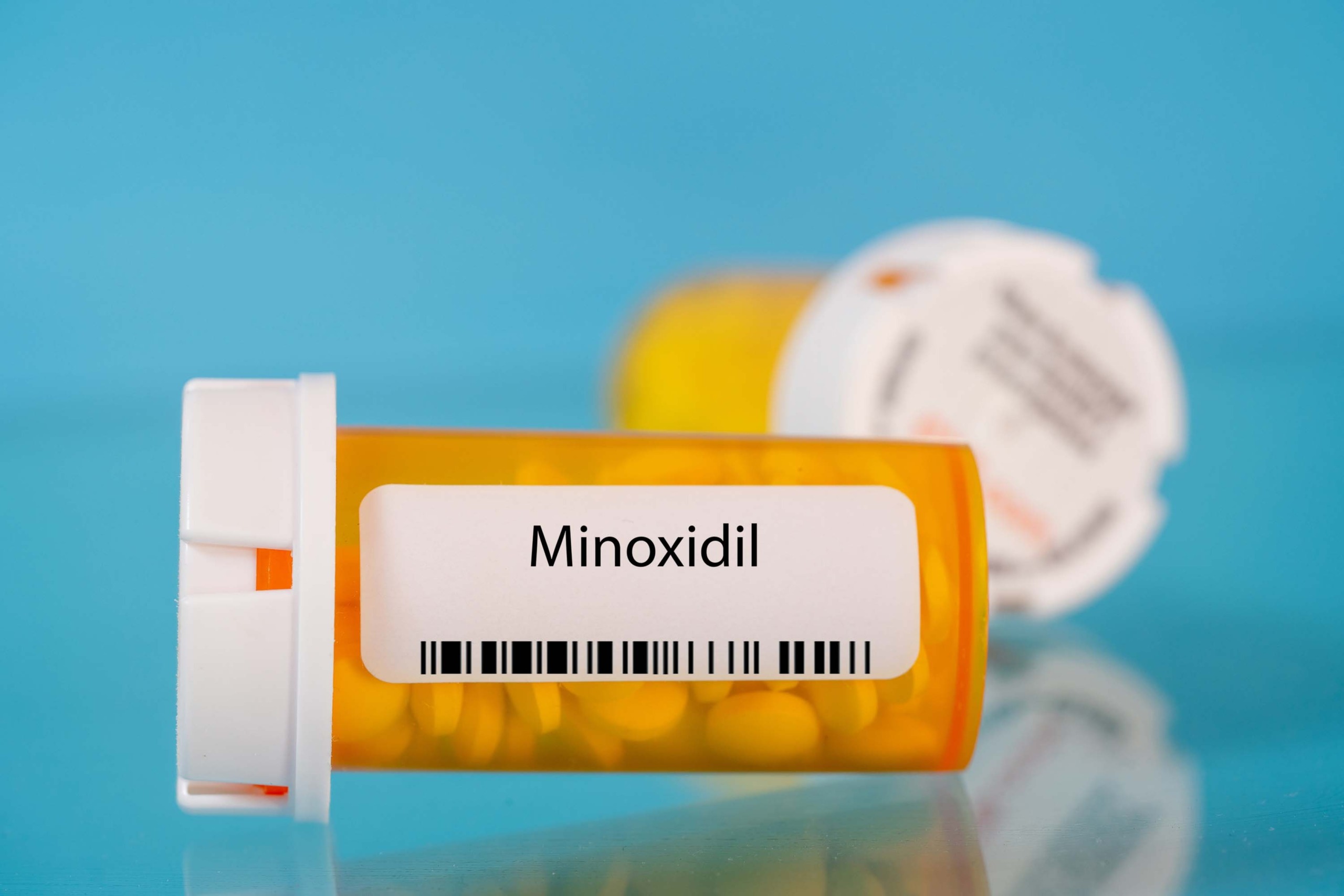 A bottle of Minoxidil tablets