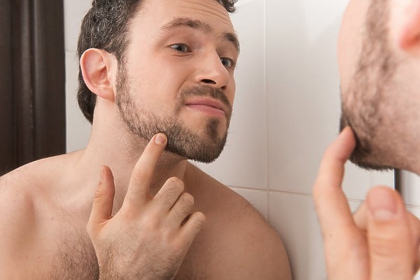 Man Checking Beard Hair Loss