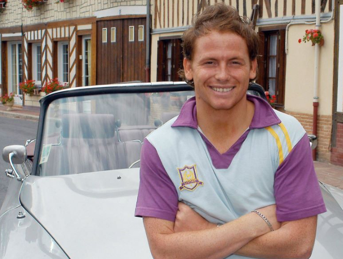 Photograph of Joe Swash playing Mickey Miller in Eastenders with his hair beginning to thin at the front.