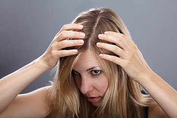 Hair Loss in Women: Types, Causes, Treatments