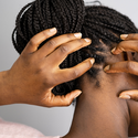 7 Reasons Your Scalp Is Tender In One Spot & How To Treat Them